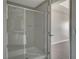 Glass enclosed shower featuring modern fixtures and tile flooring at 8255 S Las Vegas Blvd # 2004, Las Vegas, NV 89123
