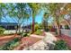Tennis courts surrounded by mature landscaping and manicured walking paths at 8255 S Las Vegas Blvd # 2004, Las Vegas, NV 89123