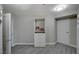 Walk-in closet with built-in shelving and drawers and wood flooring at 8255 S Las Vegas Blvd # 2004, Las Vegas, NV 89123