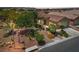 Single-story home with desert landscaping, a gated courtyard and a two-car garage at 8409 Sherwood Park Dr, Las Vegas, NV 89131