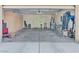 Spacious garage with ample storage cabinets and room for multiple vehicles at 8409 Sherwood Park Dr, Las Vegas, NV 89131