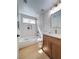 Updated bathroom featuring a shower over tub and a wood vanity at 9369 Villa Ridge Dr, Las Vegas, NV 89134