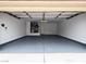 Spacious garage with painted floor and interior utilities at 9369 Villa Ridge Dr, Las Vegas, NV 89134