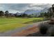 Expansive golf course with mountains in the background showcasing community's natural beauty at 9369 Villa Ridge Dr, Las Vegas, NV 89134