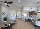 Open living space showcasing modern finishes, kitchen island and dining area at 9369 Villa Ridge Dr, Las Vegas, NV 89134