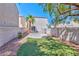 Well-maintained backyard with partial grass and patio, perfect for outdoor relaxation and entertaining at 9979 Keephills St, Las Vegas, NV 89183