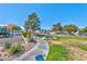Community playground featuring a picnic table, play equipment, and green space at 9979 Keephills St, Las Vegas, NV 89183