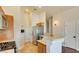 Bright kitchen with stainless steel appliances and tile flooring at 9994 Government Point Way # 101, Las Vegas, NV 89183