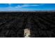 Aerial view of a home with other homes nearby in a residential neighborhood with city views at , Las Vegas, NV 89117
