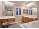 Well-lit bathroom featuring an expansive vanity, a large mirror, and modern fixtures for a sleek and refined look at , Las Vegas, NV 89117