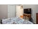 View of bedroom featuring a Parisian-themed bedspread, TV, and closet at , Las Vegas, NV 89117