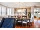 Stylish dining area with modern lighting, hardwood floors and window shutters at , Las Vegas, NV 89117