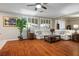 Spacious living room with large windows, hardwood floors, and comfortable couches at , Las Vegas, NV 89117