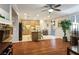 Expansive living space featuring an open-concept kitchen, hardwood floors, recessed lighting, and comfortable seating at , Las Vegas, NV 89117
