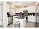 Bright kitchen featuring stylish cabinetry, stainless steel appliances, and sleek countertops at , Las Vegas, NV 89178