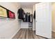 Well-organized walk-in closet with shelving and hanging space to maximize storage efficiency at , Las Vegas, NV 89178