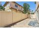 View of the backyard with perimeter fence at 1043 Monte De Oro Ave, Las Vegas, NV 89183