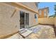 Small backyard with a sliding door at 1043 Monte De Oro Ave, Las Vegas, NV 89183