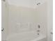 This bathroom showcases a clean tub and shower with tiled walls, providing a practical and stylish bathing experience at 1043 Monte De Oro Ave, Las Vegas, NV 89183