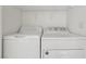 Laundry room featuring a white washer and dryer at 1043 Monte De Oro Ave, Las Vegas, NV 89183