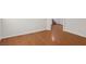 Hardwood floors in open living area lead to stairs and second floor at 1043 Monte De Oro Ave, Las Vegas, NV 89183