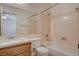 Neutral bathroom featuring a single sink vanity and bathtub with shower at 10608 Trussell St, Las Vegas, NV 89141