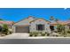 Charming single-story home with a well-manicured lawn, desert landscaping, and inviting curb appeal at 10608 Trussell St, Las Vegas, NV 89141