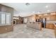 Open concept with kitchen, breakfast bar and living room at 10608 Trussell St, Las Vegas, NV 89141