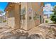 A tranquil backyard area features low-maintenance landscaping, including decorative rocks and drought-resistant plants at 10638 Pueblo Springs St, Las Vegas, NV 89183