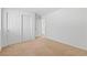 Bedroom features include double closet doors for ample storage space and a neutral carpet at 10638 Pueblo Springs St, Las Vegas, NV 89183