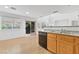 Bright kitchen area featuring stainless steel appliances and access to a backyard through sliding doors, perfect for outdoor dining at 10638 Pueblo Springs St, Las Vegas, NV 89183