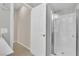 Bathroom featuring a glass shower and neutral tiling at 11237 Newbury Hills Ave, Las Vegas, NV 89138
