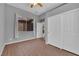 Comfortable bedroom with wood floors, closet, and a large window at 11237 Newbury Hills Ave, Las Vegas, NV 89138