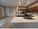 Stylish kitchen featuring stainless steel appliances, granite countertops, and a breakfast bar for casual dining at 11237 Newbury Hills Ave, Las Vegas, NV 89138