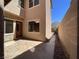 Enclosed patio with a patterned concrete floor and access to the home's interior at 11237 Newbury Hills Ave, Las Vegas, NV 89138