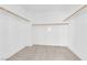 Spacious walk-in closet featuring carpet flooring and wooden rails for storage at 11237 Newbury Hills Ave, Las Vegas, NV 89138