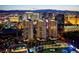 Stunning aerial view of the building complex at night overlooking the bright city lights at 135 E Harmon Ave # 518, Las Vegas, NV 89109