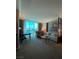 Cozy living room with ample seating and a bright, sunny window at 135 E Harmon Ave # 518, Las Vegas, NV 89109
