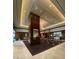 Elegant lobby area with a large pillar, modern art, and stylish lighting at 135 E Harmon Ave # 518, Las Vegas, NV 89109