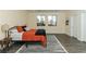 Bedroom featuring a bed with black metal frame and natural light at 1409 Denver St, Boulder City, NV 89005
