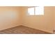 Cozy bedroom with neutral carpet and a window at 1440 Rawhide Rd, Boulder City, NV 89005