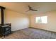 Bedroom featuring new carpet, window and a vintage style fireplace at 1440 Rawhide Rd, Boulder City, NV 89005