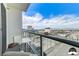 Condo balcony view with a seating area showcases the cityscape and clear blue sky at 150 Las Vegas Blvd # 1118, Las Vegas, NV 89101