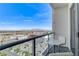 This balcony has seating with views of the city and the mountains at 150 Las Vegas Blvd # 1118, Las Vegas, NV 89101