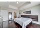 Cozy bedroom featuring hardwood floors, neutral walls, and access to an ensuite bathroom for convenience at 150 Las Vegas Blvd # 1118, Las Vegas, NV 89101