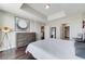This bedroom features hardwood floors, neutral walls, and access to a walk-in closet and ensuite bathroom at 150 Las Vegas Blvd # 1118, Las Vegas, NV 89101