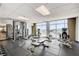 Bright gym with weights, cardio machines, and floor-to-ceiling windows offering city views at 150 Las Vegas Blvd # 1118, Las Vegas, NV 89101