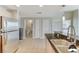 Kitchen featuring stainless steel appliances, breakfast bar and tile flooring at 150 Las Vegas Blvd # 1118, Las Vegas, NV 89101