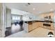 Open concept with modern kitchen featuring stainless steel appliances and breakfast bar seating at 150 Las Vegas Blvd # 1118, Las Vegas, NV 89101