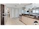 Open floor plan featuring a kitchen with stainless appliances and breakfast bar at 150 Las Vegas Blvd # 1118, Las Vegas, NV 89101